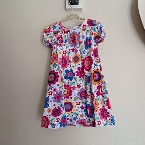 Hanna Andersson Dress White with Retro Groovy Flowers Smocked Neck Size 110 or 5